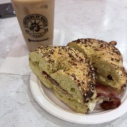 4 Brothers NY Bagels - Bacon, egg & cheese on an egg everything bagel