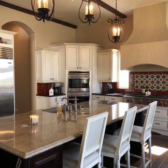 Valdez Construction Roofing - a kitchen with a center island - General Contractors Near Me - Hemet, California