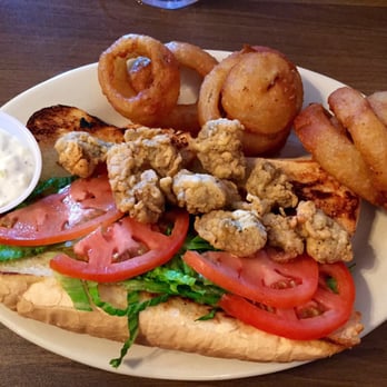 The Beach Pit - Oyster po' boy w/ onion rings - Barbeque Near Me - St. George Island, Florida The Beach Pit - Oyster po' boy w/ onion rings - Barbeque Near Me - St. George Island, Florida