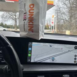 Dunkin' - It's combined with the shell gas station and has a drive thru
