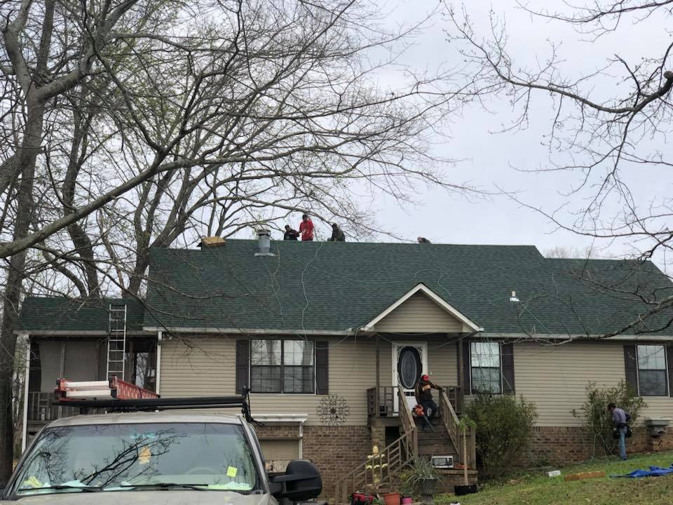 Slide of Tycon Roofing