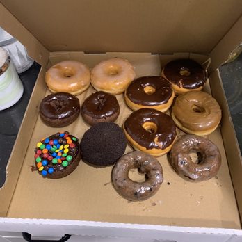 M & M Donuts - The dozen assorted doughnuts I ordered the blueberry ones are in the bottom right hand side. - Donuts Near Me - Anaheim, California M & M Donuts - The dozen assorted doughnuts I ordered the blueberry ones are in the bottom right hand side. - Donuts Near Me - Anaheim, California