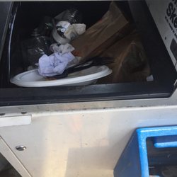 Chevron - Its's 2:44 p.m. on a Saturday. Why don't you clean out the trash?
