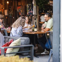 Pax Wines - Indoor & outdoor seating. With roll-up garage doors open on beautiful days.
