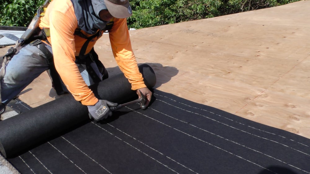 Slide of Surface Shield Roofing Company