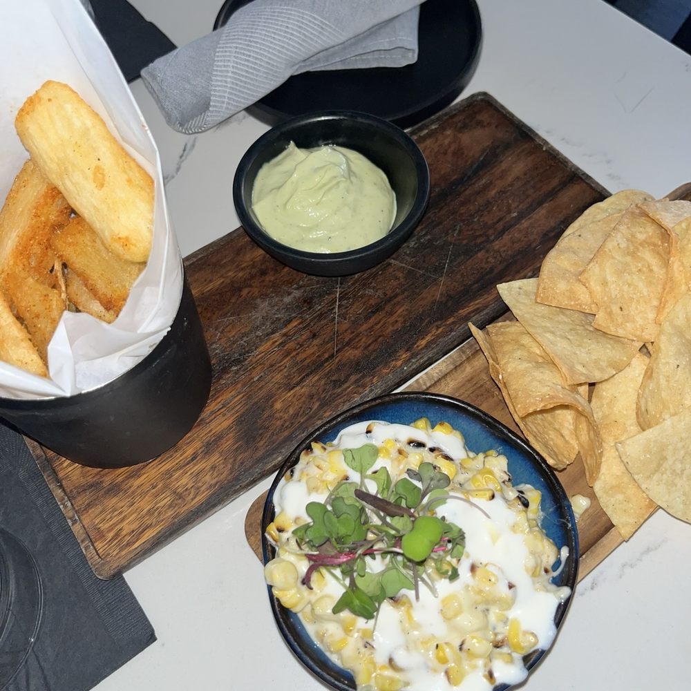 Vagabond - Yuca Fries (green sauce was the STAR OF THE SHOW) Corn esquites - Bars Near Me - Washington, DC, District of Columbia Vagabond - Yuca Fries (green sauce was the STAR OF THE SHOW) Corn esquites - Bars Near Me - Washington, DC, District of Columbia