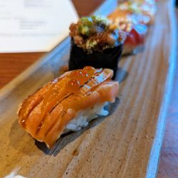 Sushi Mon - Nigiri Omakase. $45. Includes miso soup, chef's choice of 8 pieces nigiri, hand roll, tamago. See my review for description of each nigiri.