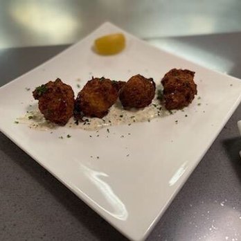 The West Table - Crab Hushpuppies with House Remoulade - New American Near Me - Lubbock, Texas The West Table - Crab Hushpuppies with House Remoulade - New American Near Me - Lubbock, Texas