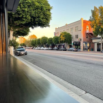 Mickey's Irish Pub - The street view from our table. The roll-up windows are awesome. - Irish Pub Near Me - Fullerton, California