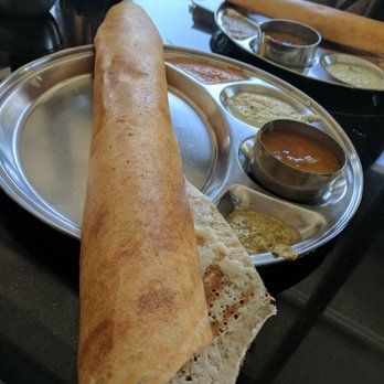 Madras Cafe - Onion masala dosa. Had too many raw onions in my opinion but was still delicious. - Indian Near Me - Sunnyvale, California