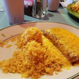 Shredded beef enchiladas with double rice. Shredded beef enchiladas with double rice.