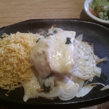 Mama Juanita's - Who doesnt want a simmering hot plate? - Mexican Near Me - Conroe, Texas