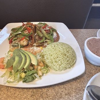Alicia's Mexican Grille - Fish tacos with cilantro rice and salad - Mexican Near Me - Houston, Texas Alicia's Mexican Grille - Fish tacos with cilantro rice and salad - Mexican Near Me - Houston, Texas