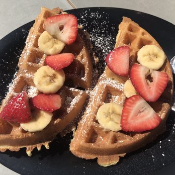 Rooster Café - St. Clair Waffle + strawberries & bananas - Breakfast & Brunch Near Me - Costa Mesa, California Rooster Café - St. Clair Waffle + strawberries & bananas - Breakfast & Brunch Near Me - Costa Mesa, California