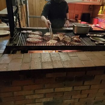 Silver Saddle Steakhouse - The grillmaster working his magic - Steakhouses Near Me - Tucson, Arizona Silver Saddle Steakhouse - The grillmaster working his magic - Steakhouses Near Me - Tucson, Arizona