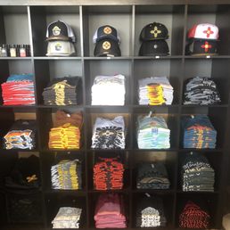 Tin Can Alley tshirt and hat display