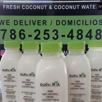 Coco Mia - three bottles of coconut milk on display - Juice Bars & Smoothies Near Me Coco Mia - three bottles of coconut milk on display - Juice Bars & Smoothies Near Me