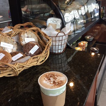 Wild Earth Bakery  - a cup of coffee and a basket of pastries - Bakeries Near Me - St Albert, Alberta