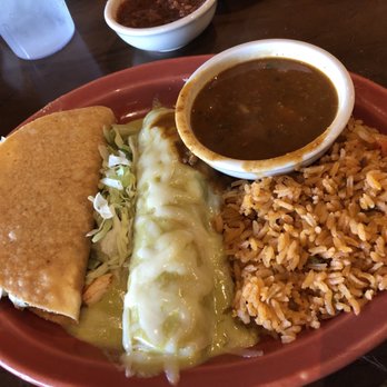 Uncle Julio's - Take two chicken taco and enchilada. Nice combo. Service was fast and friendly on a Friday afternoon in July. - Mexican Near Me - Orlando, Florida Uncle Julio's - Take two chicken taco and enchilada. Nice combo. Service was fast and friendly on a Friday afternoon in July. - Mexican Near Me - Orlando, Florida