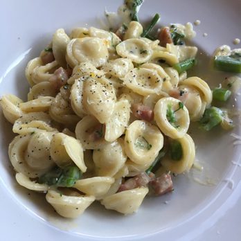 Palio - Carbonara pasta finished table side - Italian Near Me - Grand Rapids, Michigan Palio - Carbonara pasta finished table side - Italian Near Me - Grand Rapids, Michigan