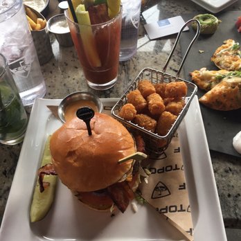 Topgolf - Sunrise burger and a Tito's top Bloody Mary. - Golf Near Me - Scottsdale, Arizona Topgolf - Sunrise burger and a Tito's top Bloody Mary. - Golf Near Me - Scottsdale, Arizona