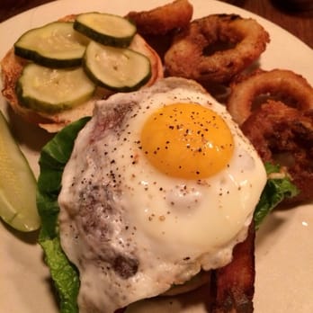 Julians - Wimpy burger with fried egg on top and onion rings on the side. - New American Near Me - Providence, Rhode Island