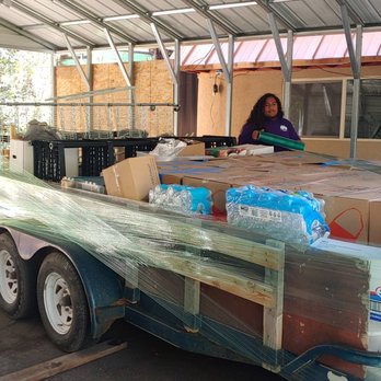 Mighty Mountain Movers - Our man Mo finishing up securing a trailer we packed to full capacity! - Movers Near Me