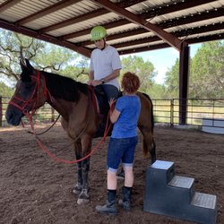 Miercoles Moon - My boyfriend just after mounting the horse during his lesson with Genevieve and Sumo.