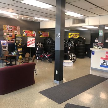 Re-Tire Automotive - Nice waiting area with an ATM, water and TV with a couch to wait in. - Tires Near Me - Enfield, Connecticut
