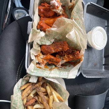 Wingstop - a tray of chicken wings and french fries - Chicken Wings Near Me - Columbus, Ohio Wingstop - a tray of chicken wings and french fries - Chicken Wings Near Me - Columbus, Ohio