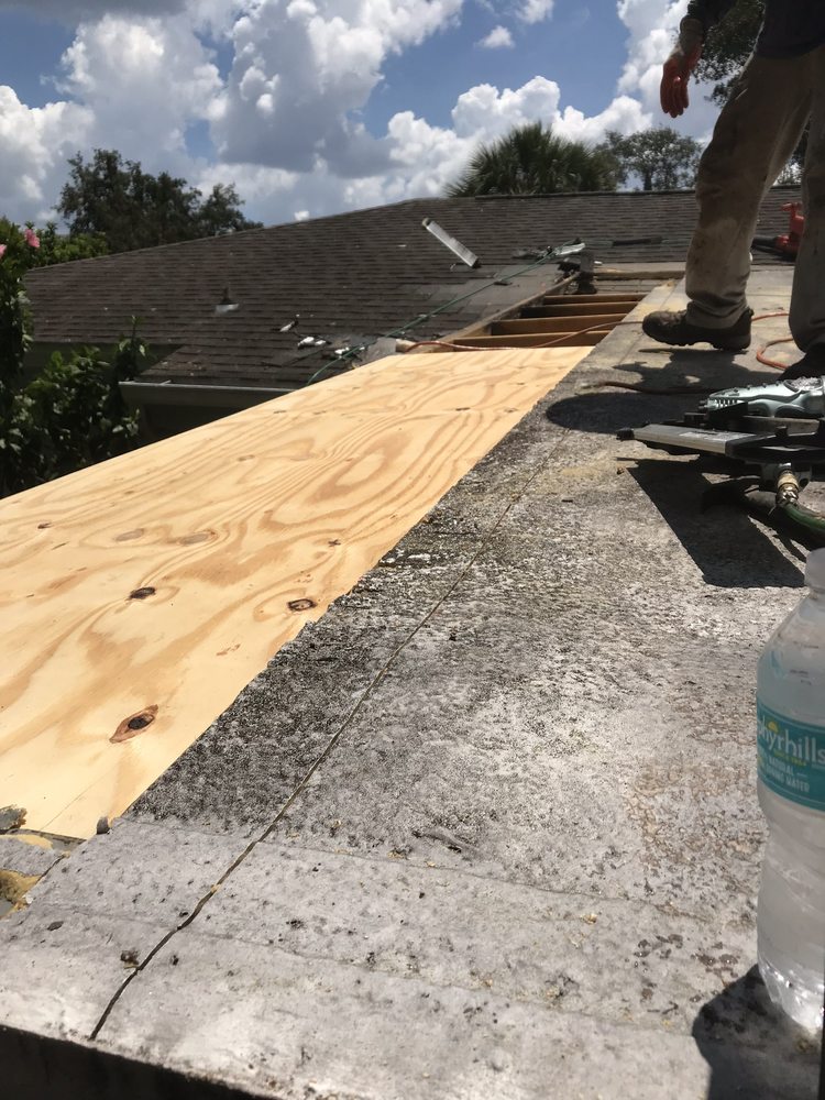 Slide of Dino Roofing Services