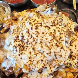 Kalbijjim - beef ribs, taebokki, mozerra cheese, potato, carrots etc Kalbijjim - beef ribs, taebokki, mozerra cheese, potato, carrots etc