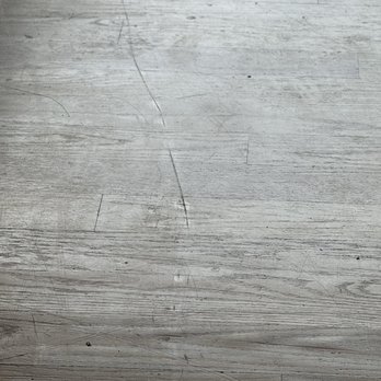 Man With A Truck Moving - Gouged wood floor. - Movers Near Me - Seattle, Washington Man With A Truck Moving - Gouged wood floor. - Movers Near Me - Seattle, Washington