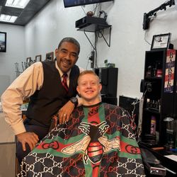 TNT Barbershop - My son and Troy. Love his haircut !