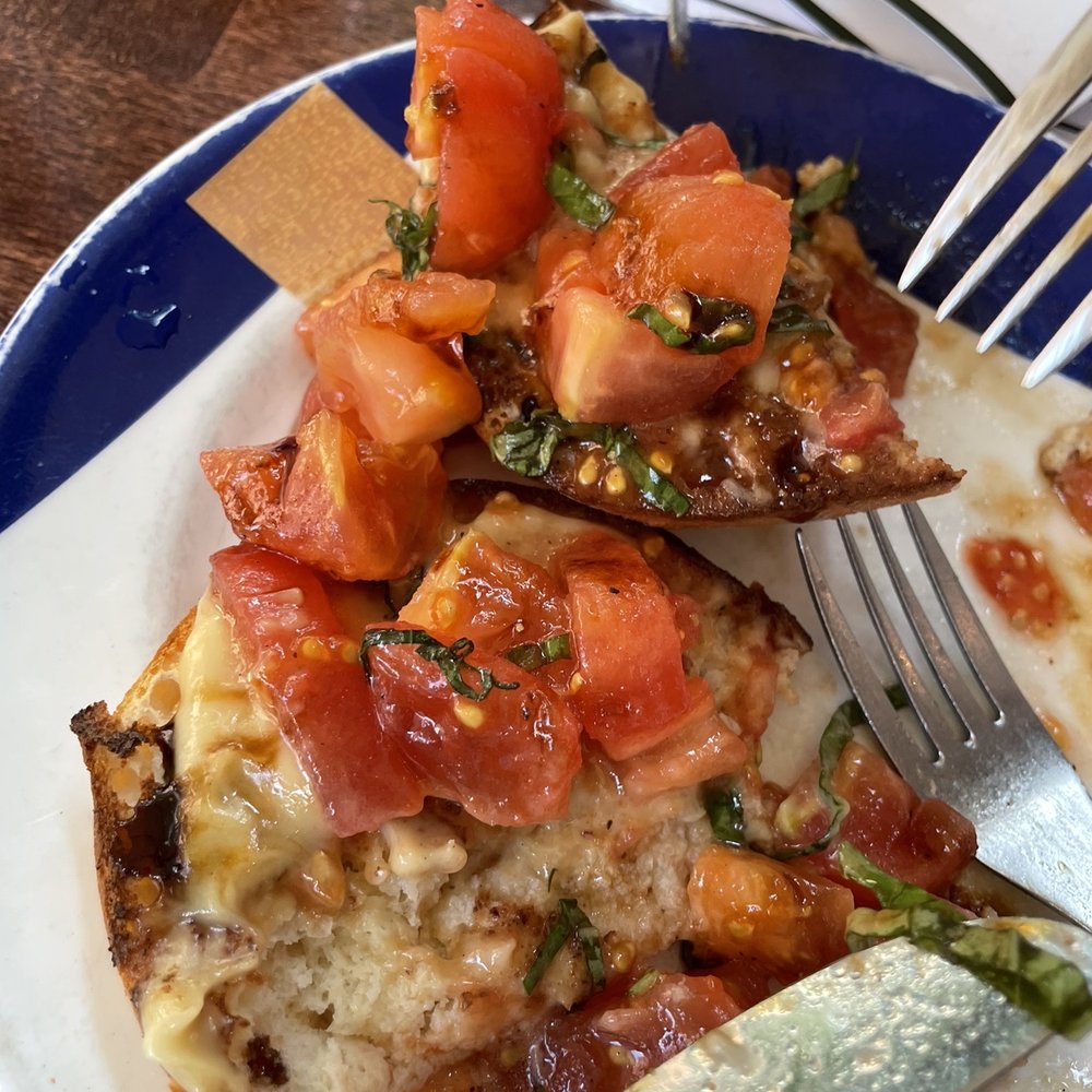 WILD - Soggy "bruschetta" served on a hamburger bun - Do not order Tomato Basil Bruschetta - New American Near Me - New York, New York WILD - Soggy "bruschetta" served on a hamburger bun - Do not order Tomato Basil Bruschetta - New American Near Me - New York, New York