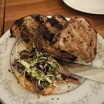 Homer - Anchovies harissa butter with house made sourdough - Mediterranean Near Me - Seattle, Washington