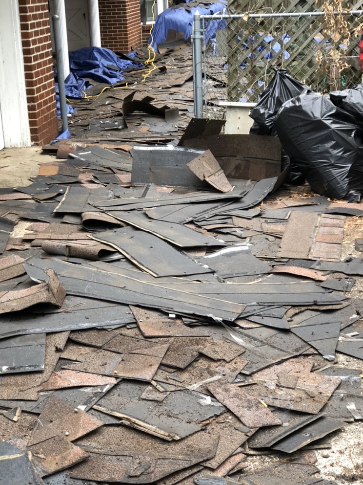 Slide of Yank's Roofing