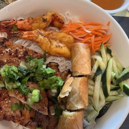 Vermicelli bowl grilled chicken and grilled shrimp. With a crunchy egg roll I substitute veggies it's usually pork Vermicelli bowl grilled chicken and grilled shrimp. With a crunchy egg roll I substitute veggies it's usually pork
