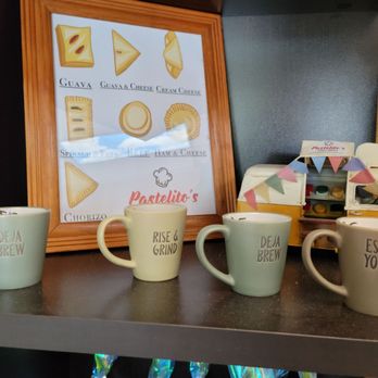 Pastelito's Cuban Bakery - three coffee mugs on a shelf - Bakeries Near Me - Knoxville, Tennessee Pastelito's Cuban Bakery - three coffee mugs on a shelf - Bakeries Near Me - Knoxville, Tennessee