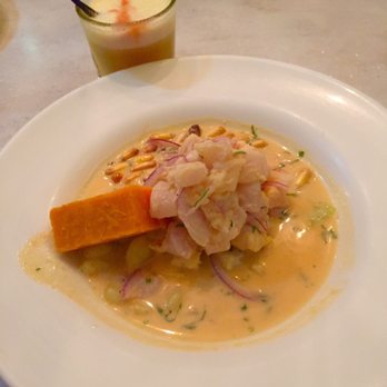 CVI.CHE 105 - Pucusana with all fish. The orange item is a sweet potato which is a great accompaniment. Order a Pisco Sour to wash it down! - Peruvian Near Me - Miami, Florida