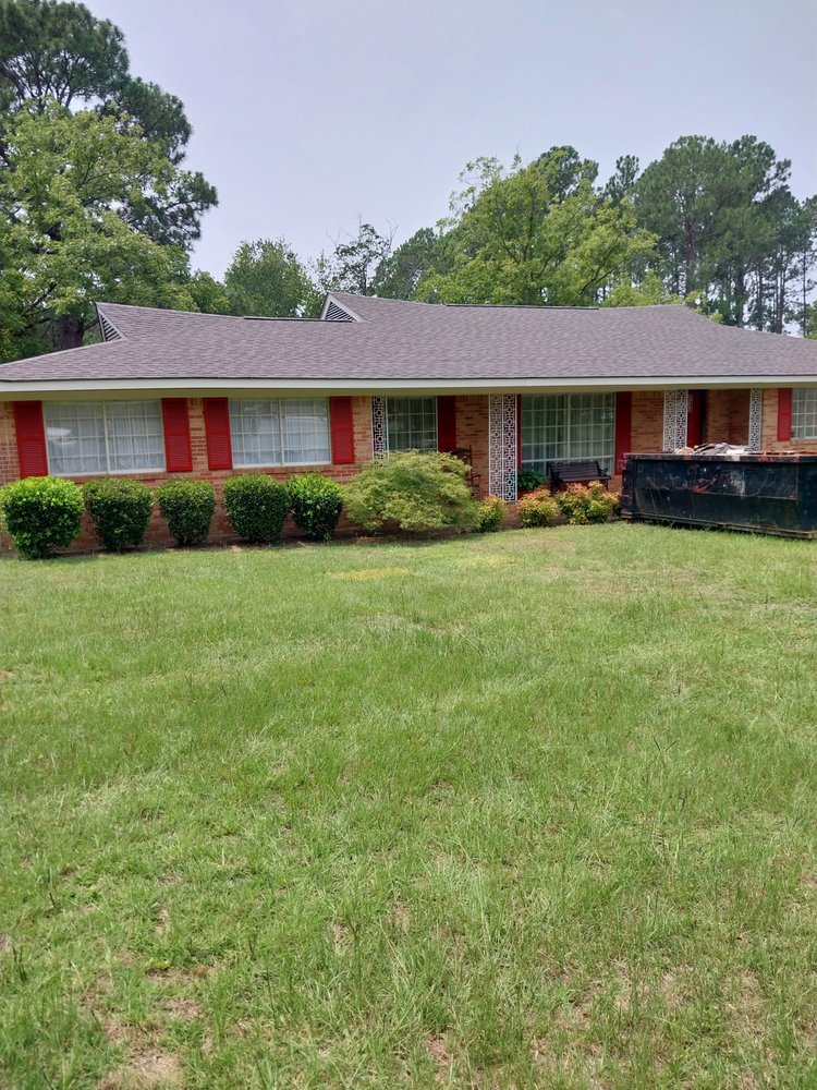 Slide of Tyndal Roofing