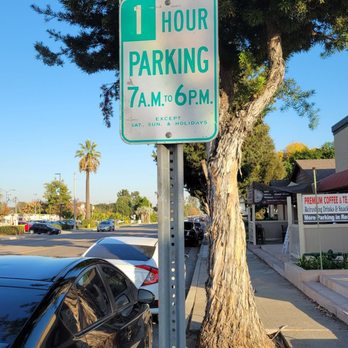 Ryo Coffee & Tea - Street parking sign right in front of Ryo Coffee & Tea - Coffee & Tea Near Me - Fullerton, California
