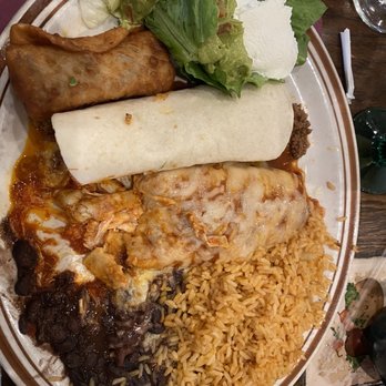 Pancho Villa's - Combo Enchilada, Chimichanga and Burrito with Black Beans and Rice - Mexican Near Me - Huntington, New York Pancho Villa's - Combo Enchilada, Chimichanga and Burrito with Black Beans and Rice - Mexican Near Me - Huntington, New York