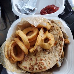 Fish on wheat pita w/onion rings Fish on wheat pita w/onion rings