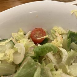 Strafford Farms Family Restaurant & Lounge - One half of the two tomatoes in my salad.