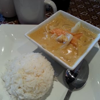 Red Curry Thai Cuisine - Yellow Curry served with rice and an egg roll (not shown). - Thai Near Me - Dallas, Texas Red Curry Thai Cuisine - Yellow Curry served with rice and an egg roll (not shown). - Thai Near Me - Dallas, Texas