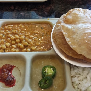 Annapurna - Chole puri comes with pickle, peppers, and sweet. - Indian Near Me - Chicago, Illinois Annapurna - Chole puri comes with pickle, peppers, and sweet. - Indian Near Me - Chicago, Illinois