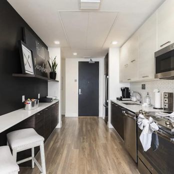Lake Nona Pixon - kitchen stainless steel appliances - Apartments Near Me - Orlando, Florida Lake Nona Pixon - kitchen stainless steel appliances - Apartments Near Me - Orlando, Florida