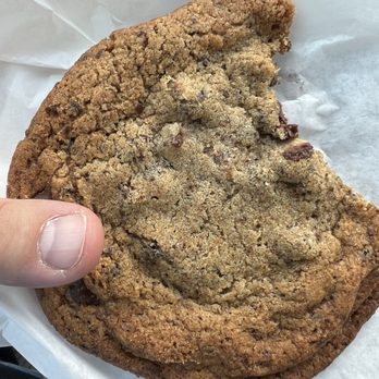 The Coffee Bar - Espresso chocolate chip cookie (thumb for scale) - Coffee & Tea Near Me - San Marcos, Texas