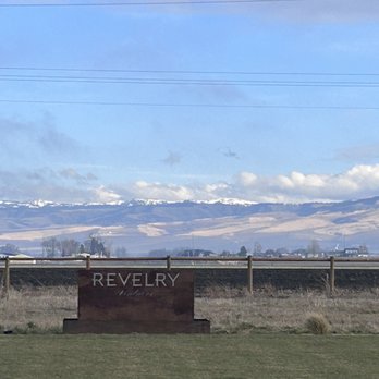 Revelry Vintners - a sign in the foreground - Wineries Near Me - Walla Walla, Washington Revelry Vintners - a sign in the foreground - Wineries Near Me - Walla Walla, Washington